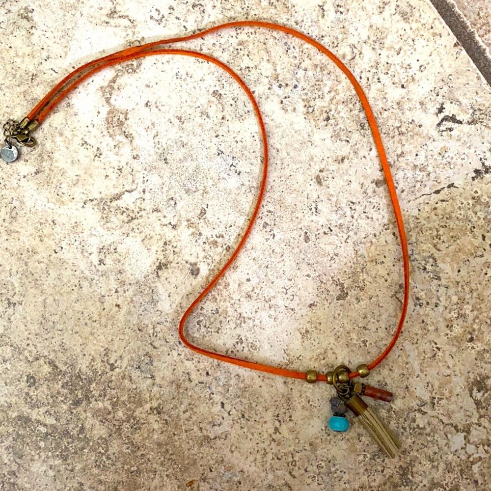 Orange leather adjustable necklace with roxk and leather dangle pendent